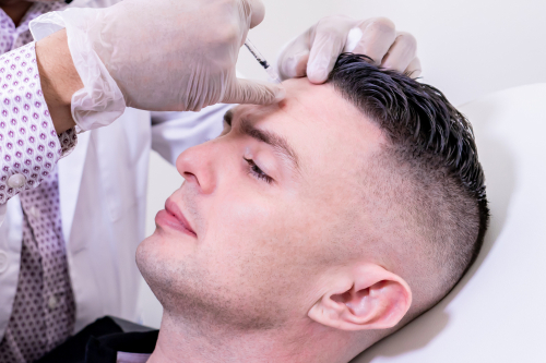 Caucasian,Man,Undergoing,Beauty,Spa,Botulinum,Neurotoxin,Botox,Treatment,For doctor-and-patient
